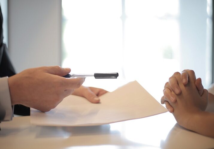 Photo of Signing Documents